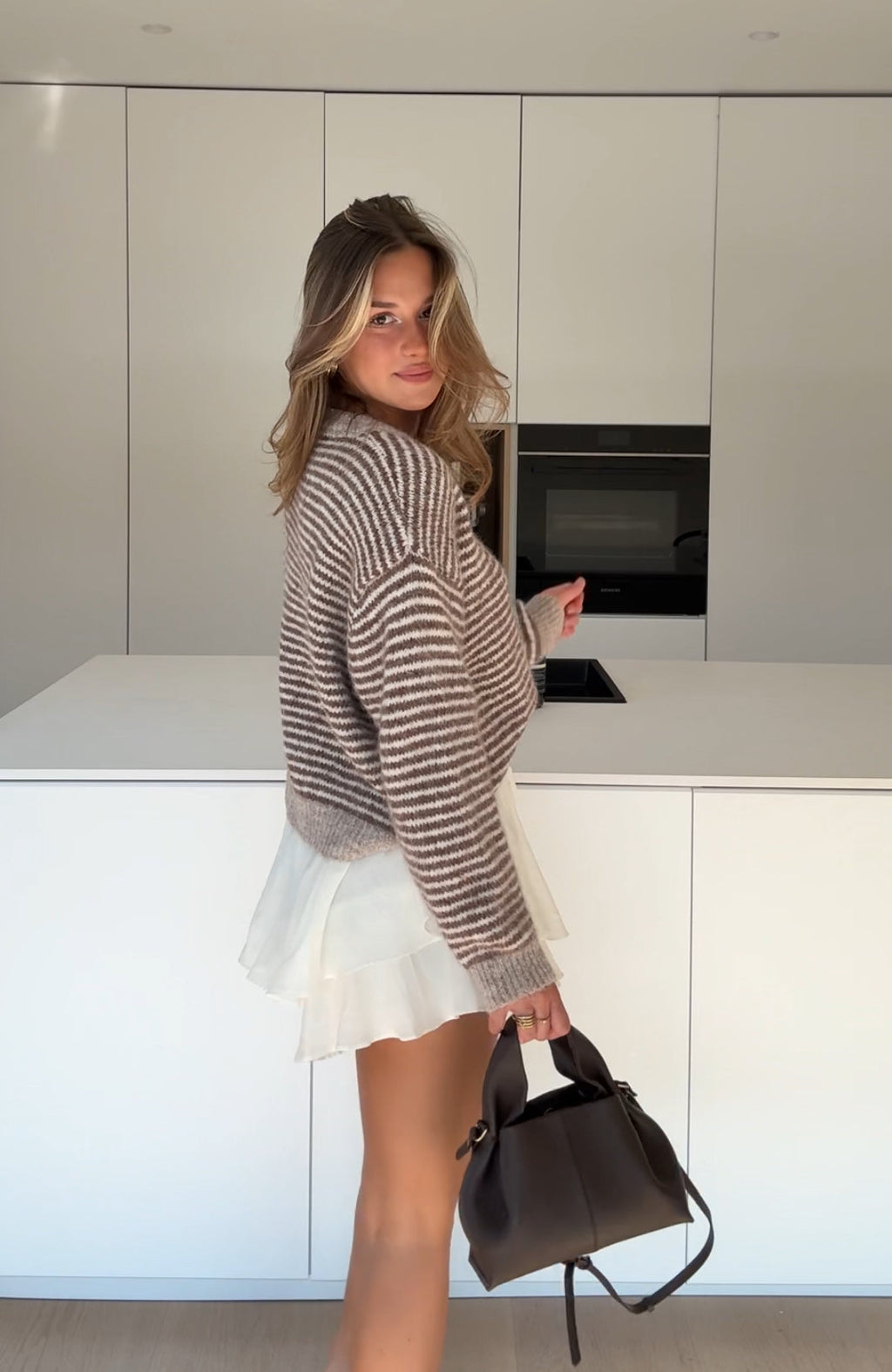 CÁRDIGAN DE RAYAS SUAVES CANELA