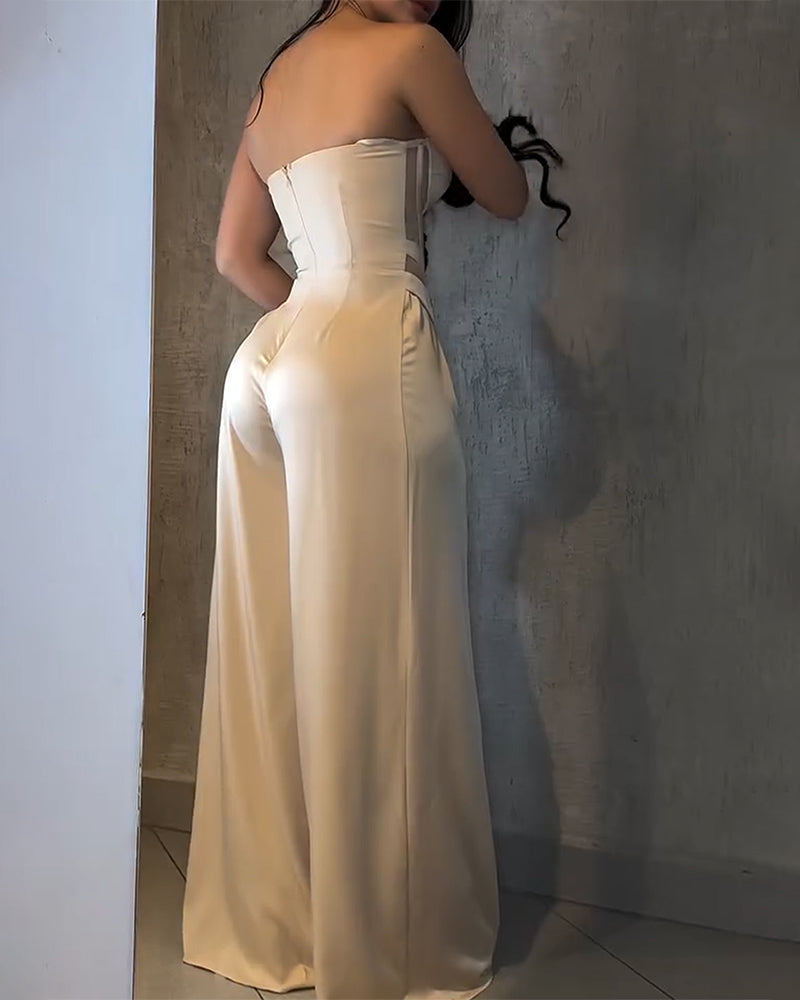Mono de pierna ancha con corsé y escote de malla tipo bustier
